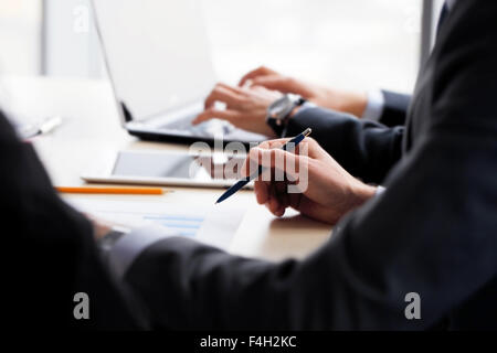 Business people working together with financial reports Stock Photo