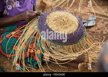 Fair trade, ornate straw baskets are woven by the women of Amongtaaba Basket Weavers Group in Bolgatanga District, Ghana. Stock Photo