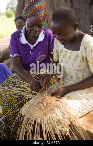 Fair trade, ornate straw baskets are woven by the women of Amongtaaba Basket Weavers Group in Bolgatanga District, Ghana. Stock Photo