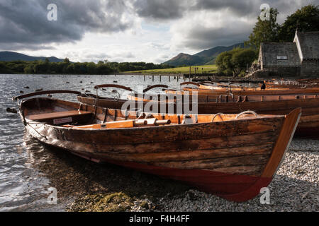 Rowing boats moored near the boathouse at Keswick landing stages, Derwent Water in the English Lake District National Park, Cumbria, England, UK Stock Photo