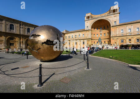 Rome. Italy. Sphere Within a Sphere by Arnaldo Pomodoro (1990), in the Cortile della Pigna, Vatican Museums. Stock Photo