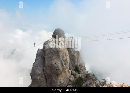 Rope bridge over the precipice on Mount Ai-Petri Stock Photo
