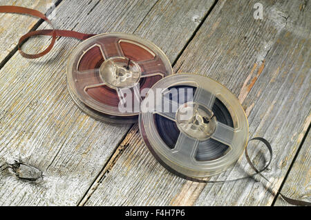 Two old music tapes on a wooden table Stock Photo