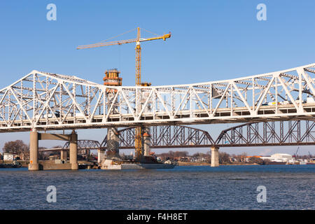 The Kennedy bridge, new I-65 bridge (under construction) and Big Four Bridge on the Ohio River in Louisville, Kentucky. Stock Photo