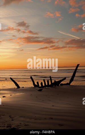 Shipwreck at sunset on Seton Sands Stock Photo - Alamy