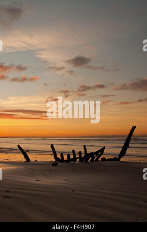 Shipwreck at sunset on Seton Sands Stock Photo - Alamy