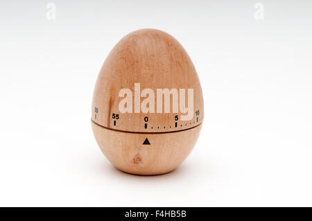 Wooden egg timer on a white background Stock Photo