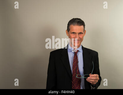 Businessman wearing glasses Stock Photo
