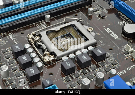 Intel LGA1155 processor socket on an ASUS motherboard. Stock Photo