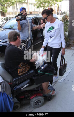 Janice Dickinson shopping for new sunglasses in Beverly Hills wearing a bulldog motif sweatshirt  Featuring: Janice Dickinson Where: Los Angeles, California, United States When: 17 Aug 2015 Stock Photo