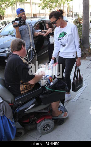 Janice Dickinson shopping for new sunglasses in Beverly Hills wearing a bulldog motif sweatshirt  Featuring: Janice Dickinson Where: Los Angeles, California, United States When: 17 Aug 2015 Stock Photo