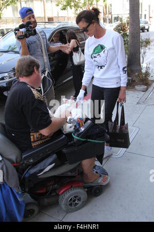 Janice Dickinson shopping for new sunglasses in Beverly Hills wearing a bulldog motif sweatshirt  Featuring: Janice Dickinson Where: Los Angeles, California, United States When: 17 Aug 2015 Stock Photo