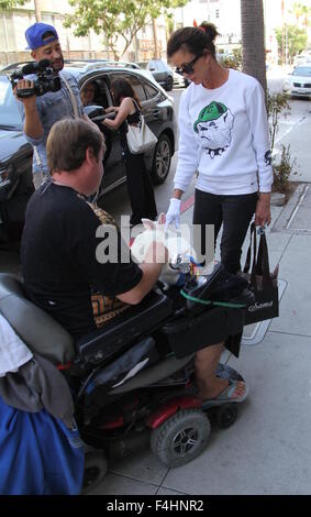 Janice Dickinson shopping for new sunglasses in Beverly Hills wearing a bulldog motif sweatshirt  Featuring: Janice Dickinson Where: Los Angeles, California, United States When: 17 Aug 2015 Stock Photo