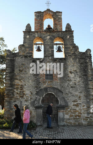 November 27, 2013 - San Antonio, Texas, United States - Tourists visit the Mission Espada Spanish mission in San Antonio, Texas on November 27, 2013. On October 17, 2015, a ceremony was held in San Antonio to officially designate the city's five Spanish colonial missions and the Ranchero de las Cabras as a World Heritage site. The missions, which include the Alamo, were approved as a World Heritage site by the United Nations Educational, Scientific, and Cultural Organization (UNESCO) on July 5 in Bonn, Germany. (Paul Hennessy/Alamy) Stock Photo