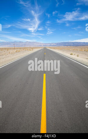 Desert highway in Death Valley, Nevada, USA. Stock Photo