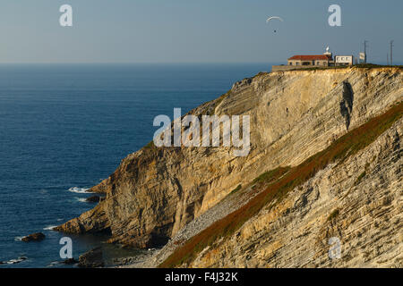 Cliffs and lighthouse. Vidio cape. Cudillero. Cantabrian Sea. Asturias provence. Spain. Europe Stock Photo
