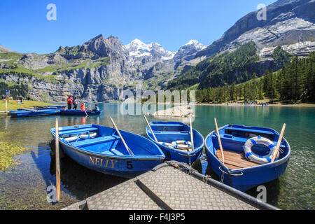 Boat trip around Lake Oeschinensee, Bernese Oberland, Kandersteg, Canton of Bern, Switzerland, Europe Stock Photo