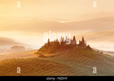 Farm house Belvedere at sunrise, near San Quirico, Val d'Orcia (Orcia Valley), UNESCO, Siena Province, Tuscany, Italy Stock Photo