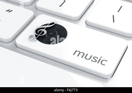 Play key with black vinyl record on the keyboard. Play music online concept Stock Photo