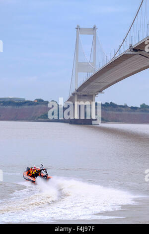 New SARA  (Severn Area Rescue Association)lifeboat'Jim Hewitt' on River Severn under Severn Bridge after launch at Beachley. Stock Photo