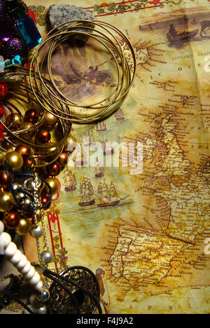 Detail of old maps and treasures in trunk Stock Photo