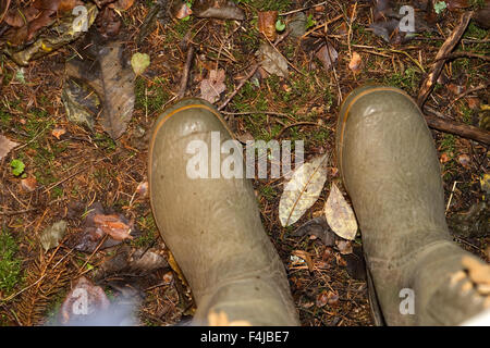 A pair of boots on the ground, Sweden. Stock Photo