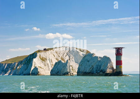 The Needles is a row of three distinct stacks of chalk that rise out of the sea off the western extremity of the Isle of Wight. Stock Photo