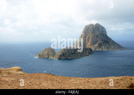 ES VEDRA, an uninhabited rock island situated 2km off the west coast of Ibiza, in the Cala d'Hort area. Stock Photo