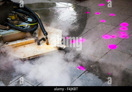 Southport, Merseyside, UK 19th October, 2015.  Launch of Keep Britain Tidy Campaign. Trial of street chewing gum removal machine in Southport operated by Primoserve Environmental Ltd in advance of the launch of the latest Keep Britain Tidy campaign on the 20th October.  The particular machine, one of only three in the country, uses high temperature steam to remove and loosen the gum which is then transferred to an adjacent trailer.  The discarded street pavement gum, to be targeted, is highlighted with a magenta fluorescent spray. Stock Photo