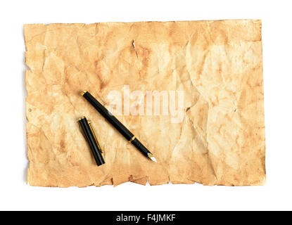 ink pen and aged paper parchment Stock Photo