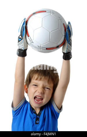 Boy with football, cheering boy holding a football, cut out of a boy with football, boy and football on a white background Stock Photo