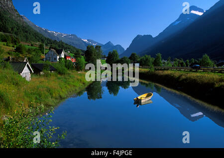 Rowing boat on lake in mountains Stock Photo