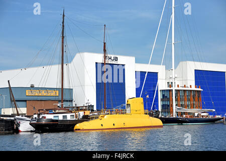 HJB Holland Jachtbouw is based in Zaandam, near  Port  of Amsterdam Netherlands Yellow Submarine ( Noordzeekanaal North Sea Canal )  Whether building sailing yachts or motor yachts, the skilled teams take a pride in their work to produce a world class product using efficient modern techniques and cutting edge technology, ultimately providing each client with an exceptional yacht at a realistic price level.  Holland Jachtbouw is based in Zaandam, on the outskirts of Amsterdam, with deep-water direct access to open waters just under one hour from the shipyard. Stock Photo