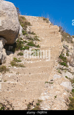 Steps at Tout Quarry sculpture park, Isle of Portland, Dorset UK in October - looking up stairway to heaven steps to nowhere concept Stock Photo