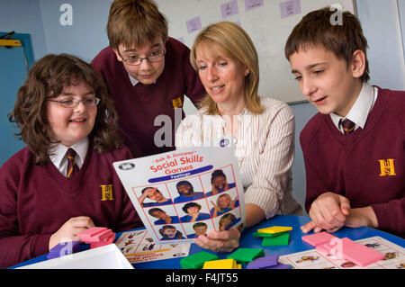 Teacher Annette Box teaching autistic students at Hanham High School, Bristol. Stock Photo
