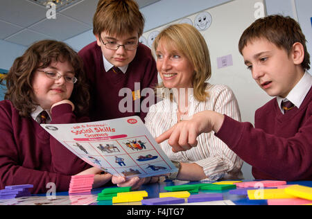 Teacher Annette Box teaching autistic students at Hanham High School, Bristol. Stock Photo