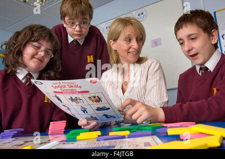 Teacher Annette Box teaching autistic students at Hanham High School, Bristol. Stock Photo