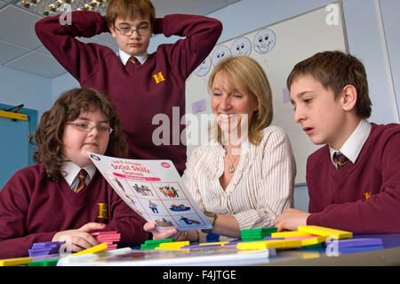 Teacher Annette Box teaching autistic students at Hanham High School, Bristol. Stock Photo