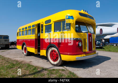 Old fashioned vintage city bus ZIS -155 (made in 1947) is on display at the festival 'Old Car Fest 2015' Stock Photo