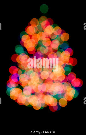 Out of Focus Christmas Tree Lights on a Black Background Stock Photo