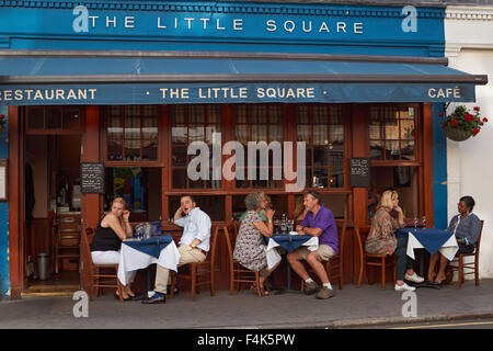 People sitting outside The Little Square restaurant in Mayfair, London England United Kingdom UK Stock Photo