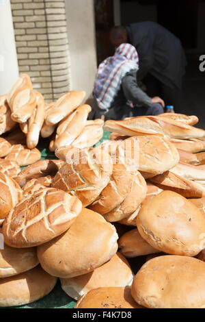 Bread seller in market, Tozeur, Tunisia Stock Photo