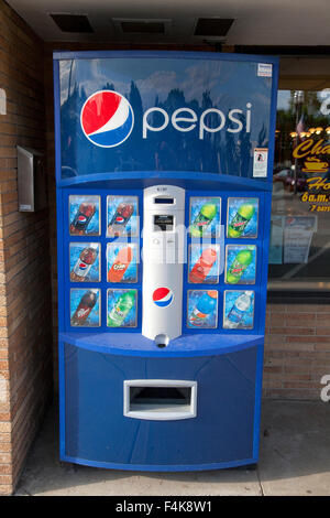 Outside coin operated vending machine for Pepsi soda products. Freeport Minnesota MN USA