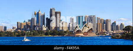 Australian SYdney cityline panorama from harbour with major skyscrapers forming landmark CBD Stock Photo
