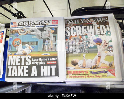 Headlines of New York newspapers are seen on Sunday, October 11, 2015 reporting on the previous days injury to Mets shortstop Ruben Tejada by L.A. Dodgers Chase Utley.  (© Richard B. Levine) Stock Photo
