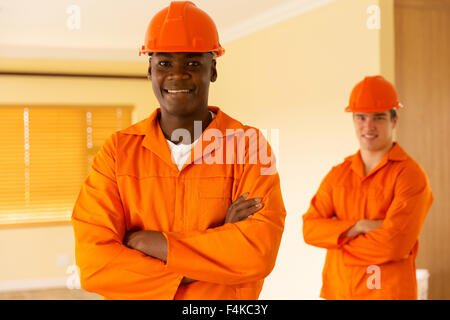 portrait of African workman and co-worker on background Stock Photo