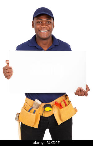 portrait of young afro American repairman presenting white board Stock Photo