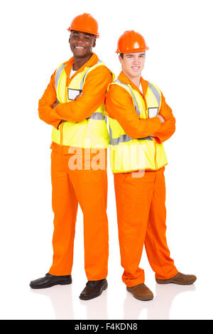 portrait of industrial workers standing back to back on white background Stock Photo