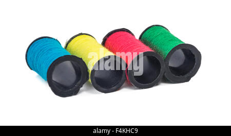 Multi color sewing thread with isolated white background Stock Photo