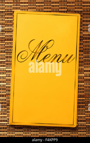 Yellow framed menu book in closeup Stock Photo